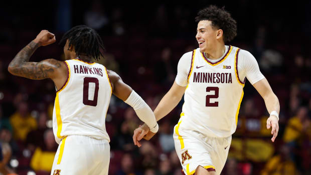 Elijah Hawkins and Mike Mitchell Jr. celebrate